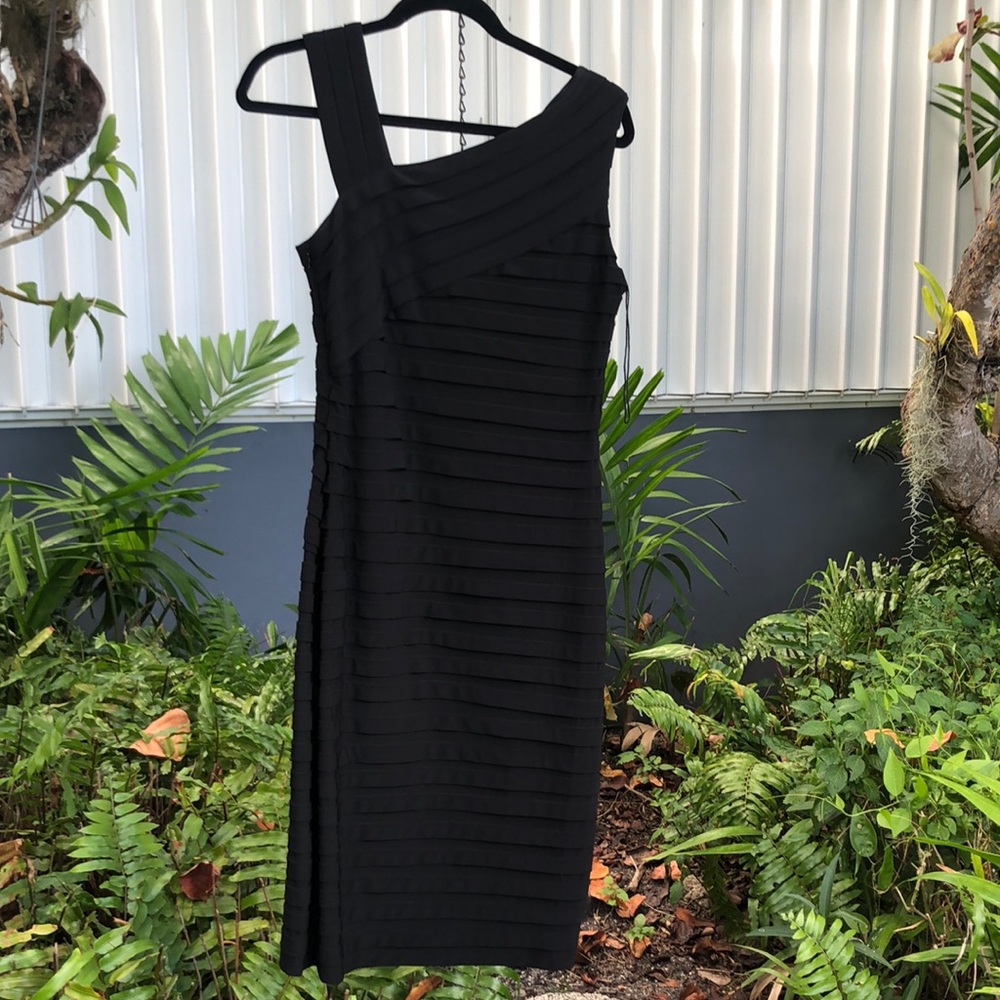 Bandage cocktail dress gently worn. Size 10. Sexy on.